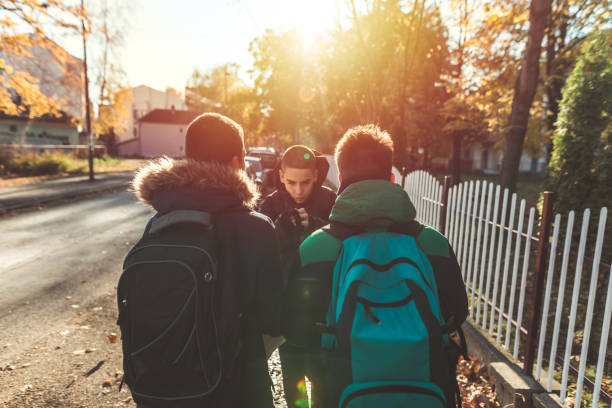 Way to school. Two angry teenage boys Way to school. Two angry teenage boys schoolyard fight stock pictures, royalty-free photos & images