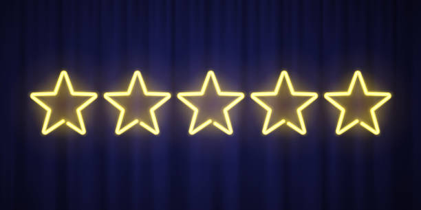 istock Five yellow neon stars rating design element isolated on blue curtain background. Vector neon star shapes for ranking interface. 1080885602