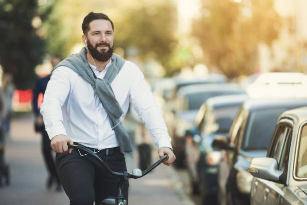 istock Handsome hipster enjoying city ride by bicycle 1080888270