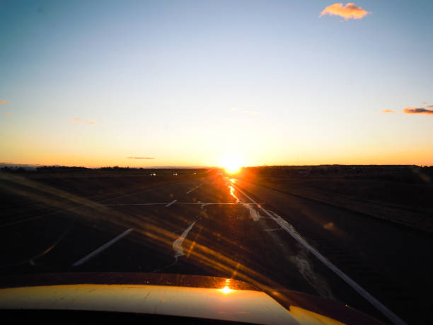 istock Trans-Canada Highway (Highway 1) at daybreak, from Banff to Calgary, Alberta, Canada 1080888328