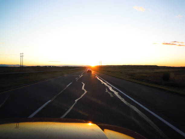 istock Trans-Canada Highway (Highway 1) at daybreak, from Banff to Calgary, Alberta, Canada 1080888344