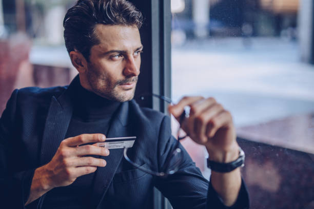 Man holding his credit card