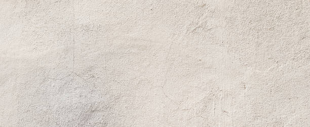 closeup old surface bright cream cement background texture mock up for design as presentation or simple banner ads concept
