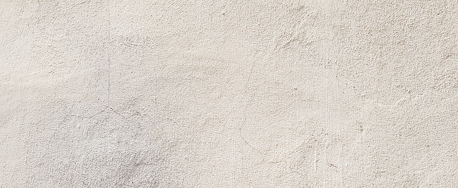 closeup old surface bright cream cement background texture mock up for design as presentation or simple banner ads concept