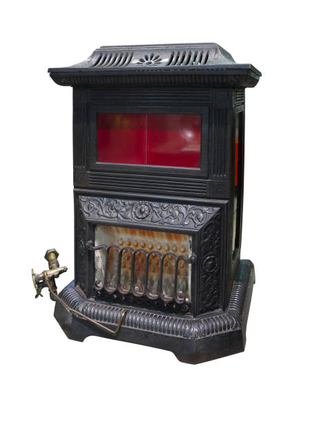 istock Old vintage burning heater cast iron stove isolated on white background 1080909720