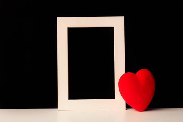 istock Picture frame and heart shape on blackboard 1080913900