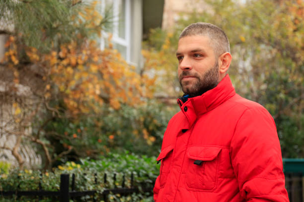Facial Expressions Of Young Beard Man On Wall