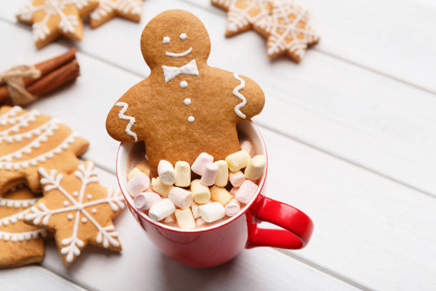 istock Gingerbread cookies and cup of chocolate with marshmallows 1080923950