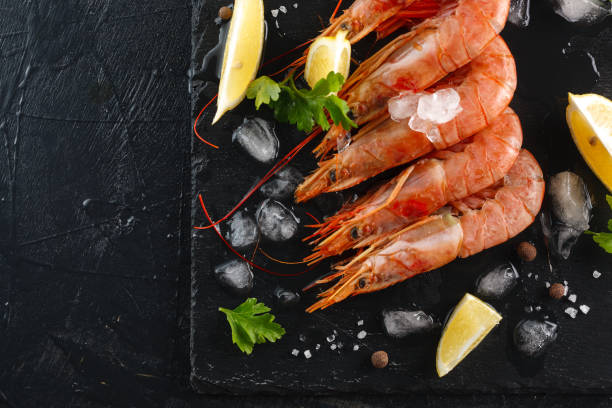istock Tiger shrimps with spices and lemon. langoustines 1080934374