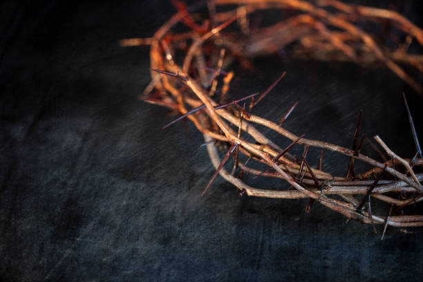 istock Easter Crown of thorns on an old wood background 1080944184
