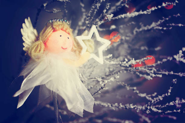 Christmas angel holding a star