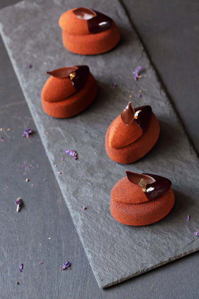 istock Contemporary Chocolate Violet Mousse Mini Cakes 1080949046