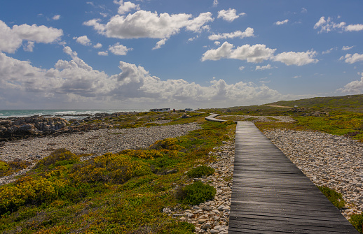November 27, 2018, Cape Town, South Africa: People are seen at Cape Agulhas, the southern-most tip of the African continent and the beginning of the dividing line between the Atlantic and Indian Oceans.