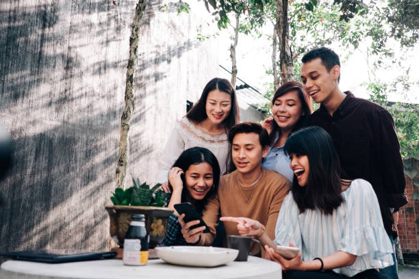istock Group of Young Asian People with Smartphone 1080960142