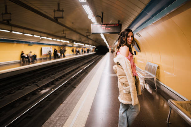istock Young woman inside an underground station platform 1080965444
