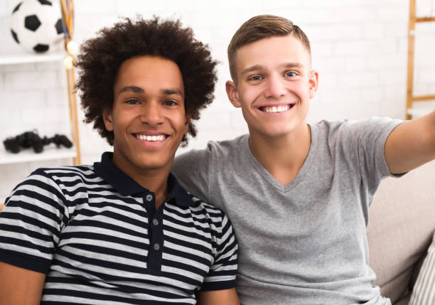 istock Happy diverse best friends making selfie on mobile phone 1080967136