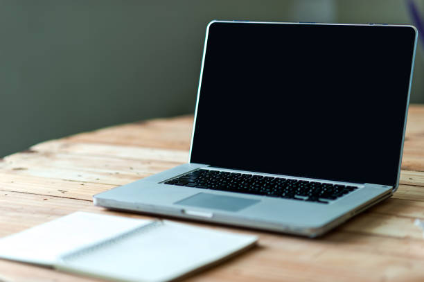 istock A desk with a business computer and a note on the desk. Business concept with copy space. 1080968338