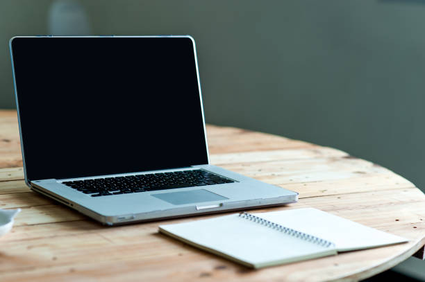 istock A desk with a business computer and a note on the desk. Business concept with copy space. 1080968340