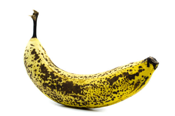 istock Ripe brown banana isolated on white background 1080969372