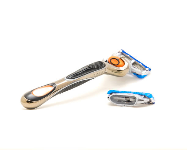 istock Studio shot men shaving razor with blade refill isolated on white 1080971950