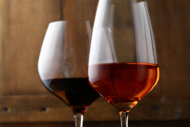 istock Wine glasses on wooden backdrop 1080980076