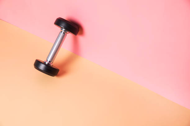 istock Gym equipment with pastel minimal background 1080985508