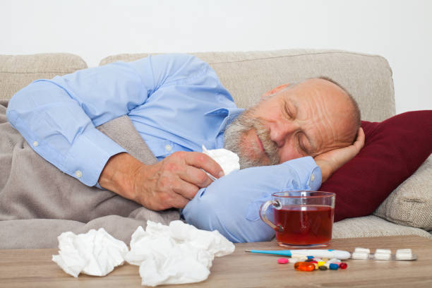 sick elderly man - painkiller thermometer tea prescription medicine imagens e fotografias de stock