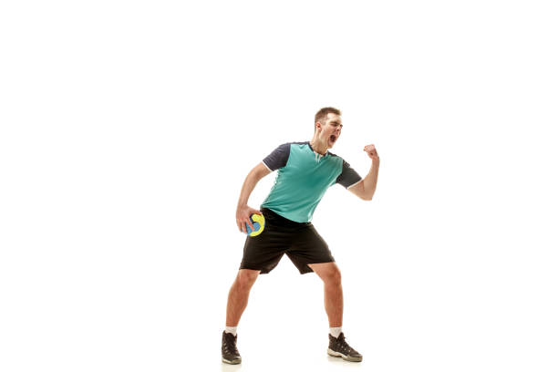 istock The one caucasian young man as handball player at studio on white background 1080986482