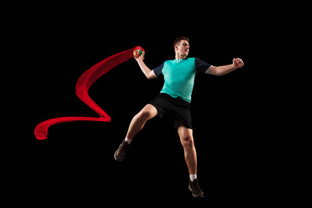 istock The one caucasian young man as handball player at studio on black background 1080986504