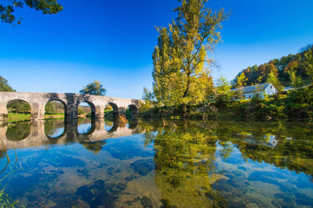istock Old stone bridge i Croatia 1080992854