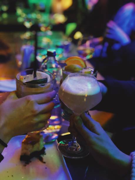 istock Friends drinking cocktails 1080995324