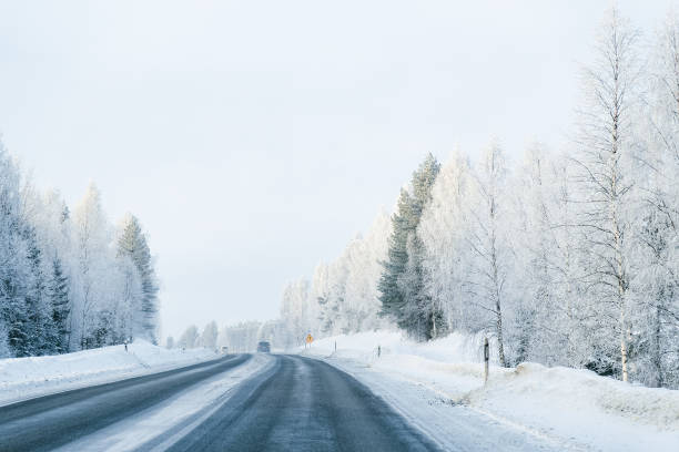 istock Winter road and Snowy Forest at Cold Finland 1081004562