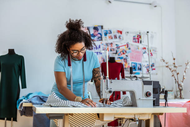 istock Professional female designer with one hand covered in tattoo 1081009806