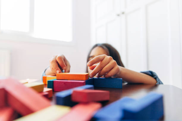 istock Little girl playing game 1081013752