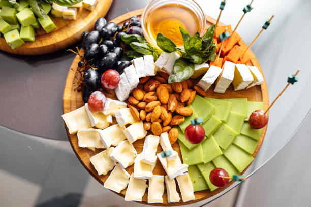 istock Tasting cheese dish . Delicious cheese on the table. Table setting at a luxury wedding reception. 1081025458