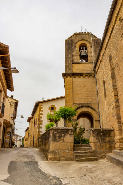 Street view with the bell tower of the Church of San Salvador in the village of Lorca, Navarre, Spain Lorca street view with the bell tower of the Church of San Salvador, Church of the Savior in the village of Lorca, Navarre, Spain lorca stock pictures, royalty-free photos & images