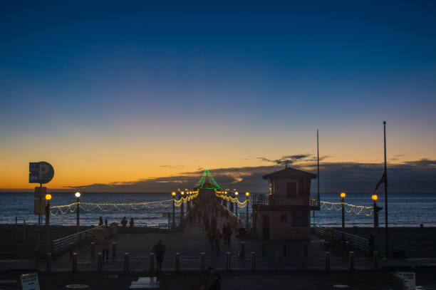 istock Holiday lights adorn Manhattan Beach Pier at sundown 1081049982