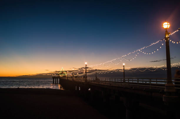 istock Holiday lights adorn Manhattan Beach Pier at sundown 1081050006