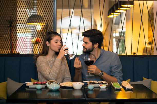 istock Young couple in a restaurant 1081053572