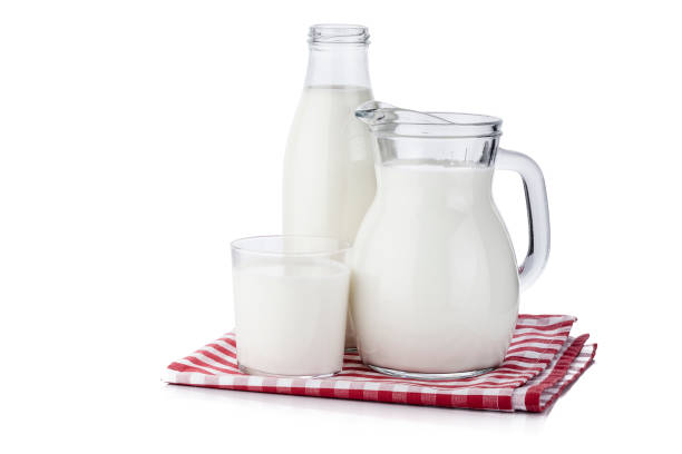 istock Milk jar, milk bottle and glass isolated on white background 1081054282