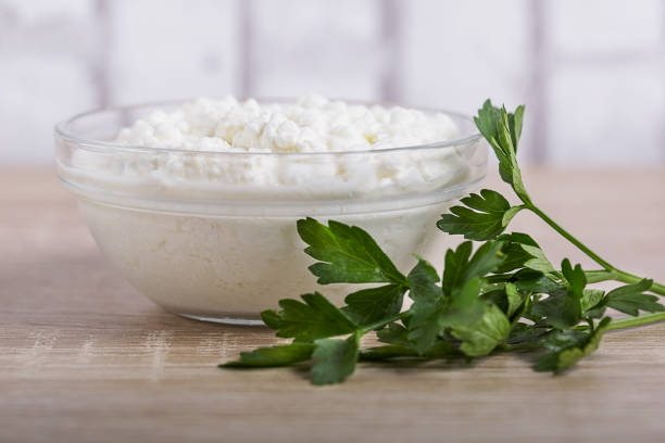 istock A fresh ricotta cheese with parsley leaf on white marble table 1081060580