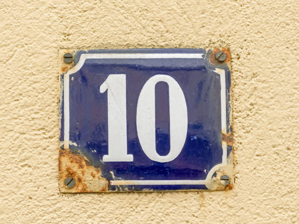 istock Old-fashioned enamel sign with house number 10 1081082648