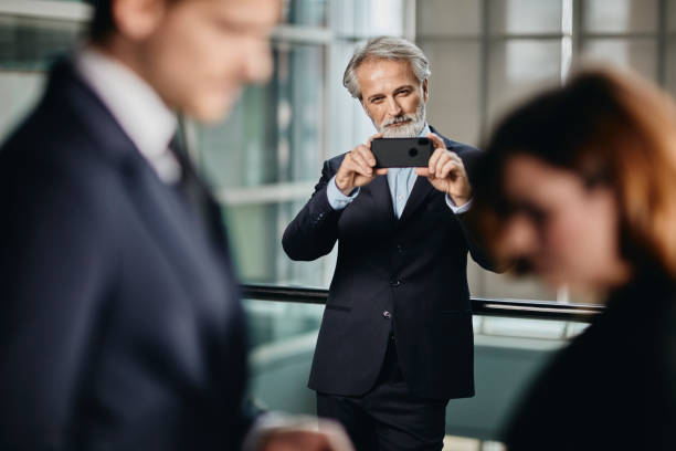 istock handsome senior business man  in a corporate setting 1081108880