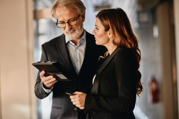 istock handsome senior business man  in a corporate setting 1081109494