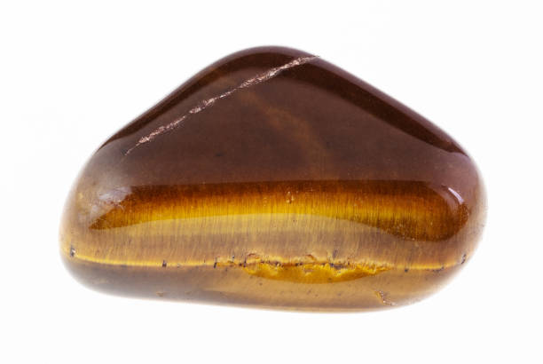 istock polished tiger's eye (tiger-eye) gem on white 1081110126