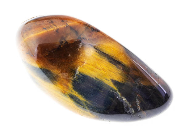istock polished tiger eye and hawk eye gem stone on white 1081110154