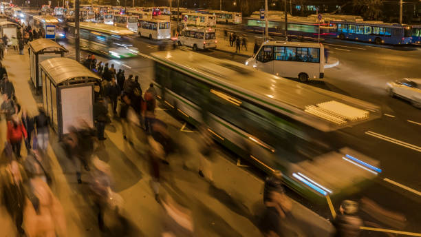 istock passengers waiting and boarding buses at the bus terminal, 1081117454