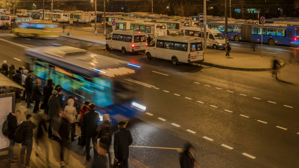 istock passengers waiting and boarding buses at the bus terminal, 1081117456