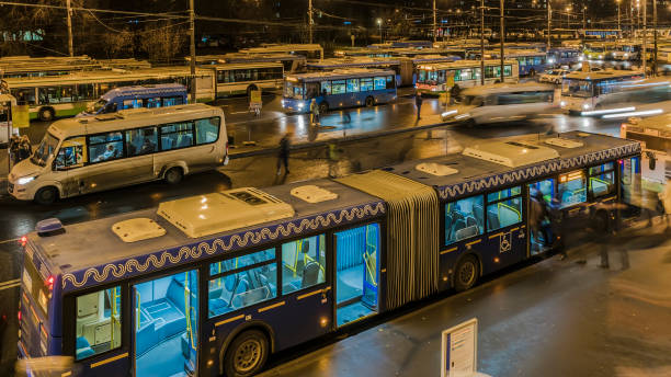 istock passengers waiting and boarding buses at the bus terminal, 1081117466