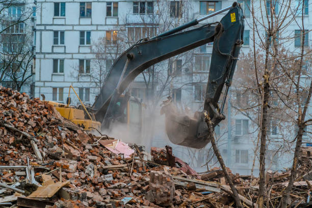 istock excavator working on the wreckage of the building, 1081119456